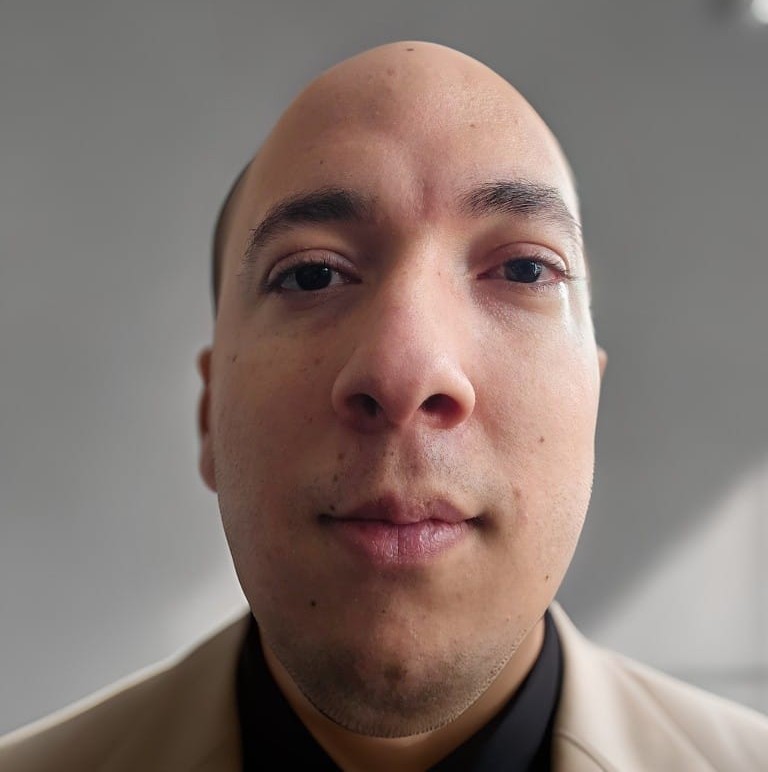 Enmanuel Ponce White smiling